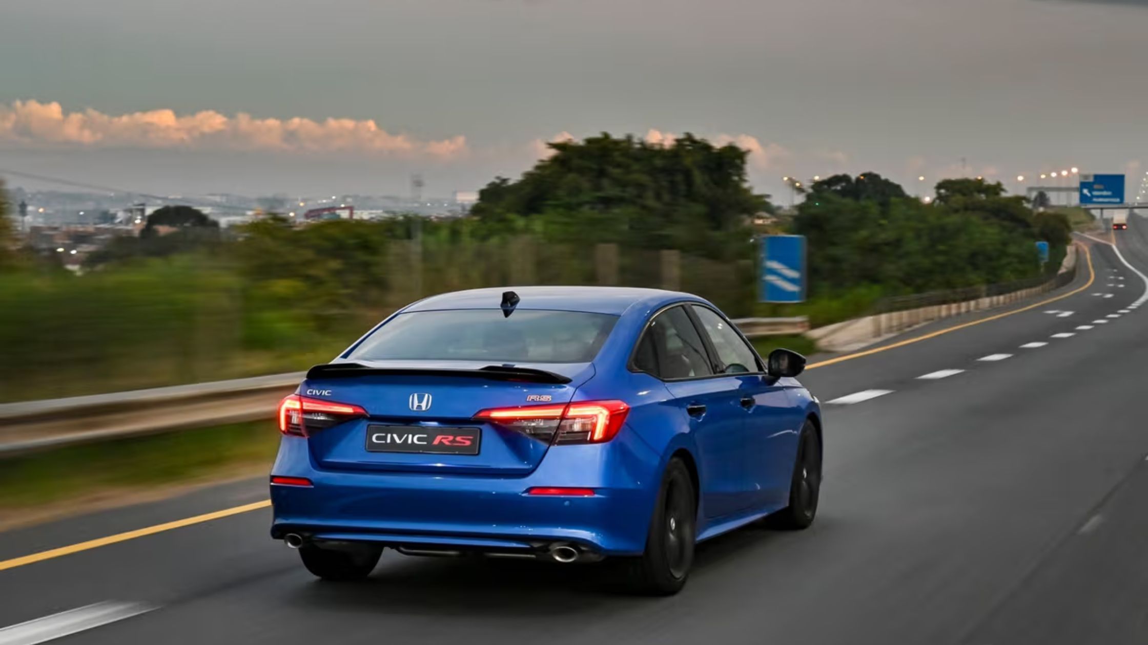 Honda Civic RS driving on the highway